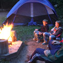 Campers enjoying a campfire