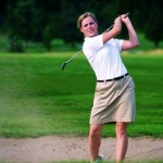Woman playing golf