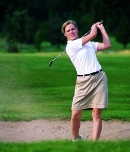 Woman playing golf